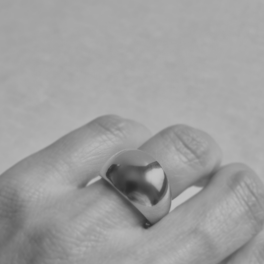 Species by the Thousands Big Sky Dome Ring in brass on finger.